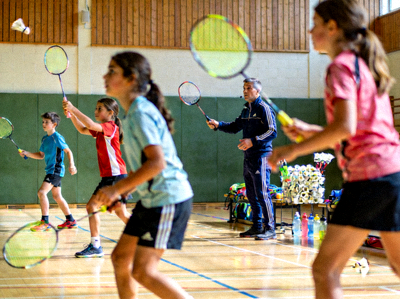 Badminton training session for young athletes at a community sports center